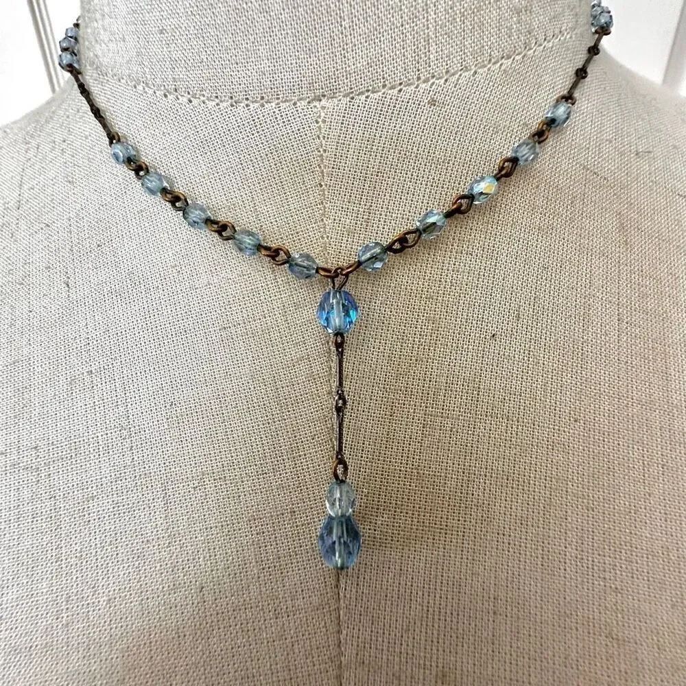 Silver/   gold tone and blue Y necklace